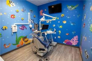 Kids dentist room with cartoons